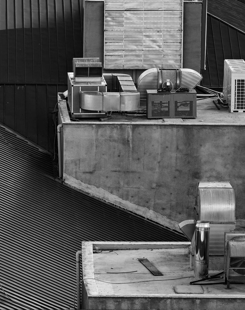Black and white view of rooftop air conditioning units and structures in Istanbul.